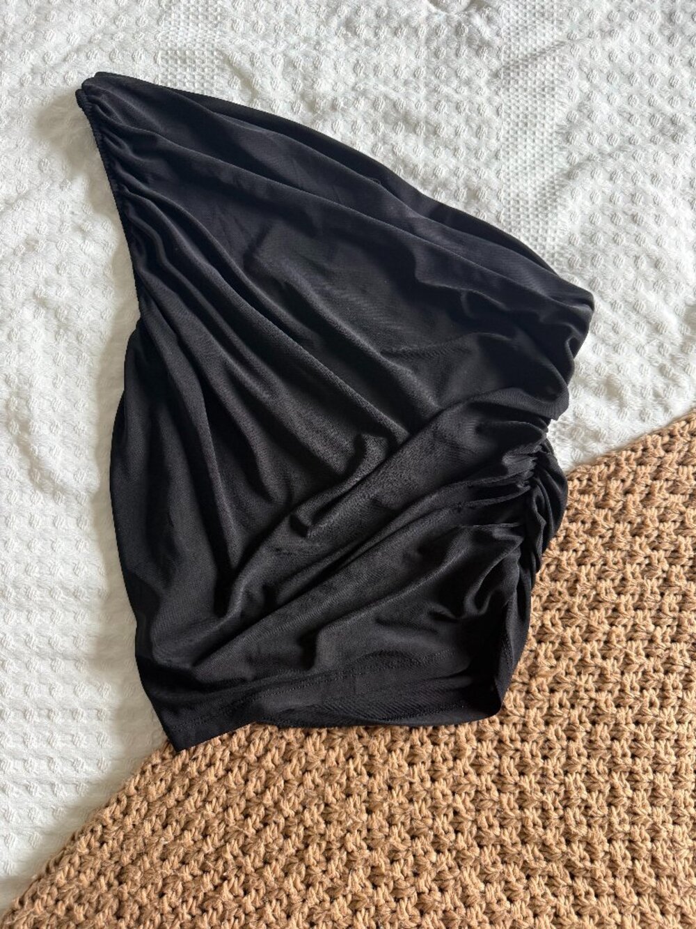 One shoulder fitted black top